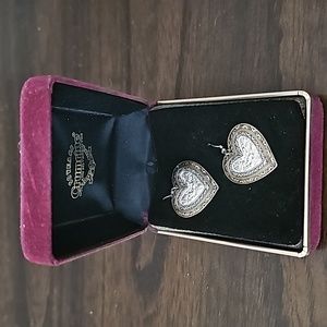 New silver and gold toned heart shaped dangling earrings
